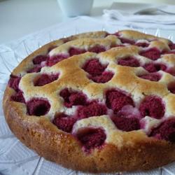 Sweet pie with raspberries on shortcrust pastry